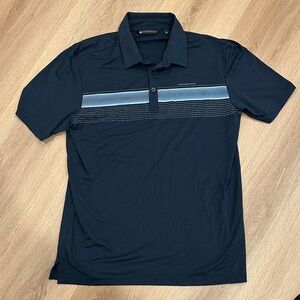 Travis Mathew Navy Polo with Light Blue Chest Stripe